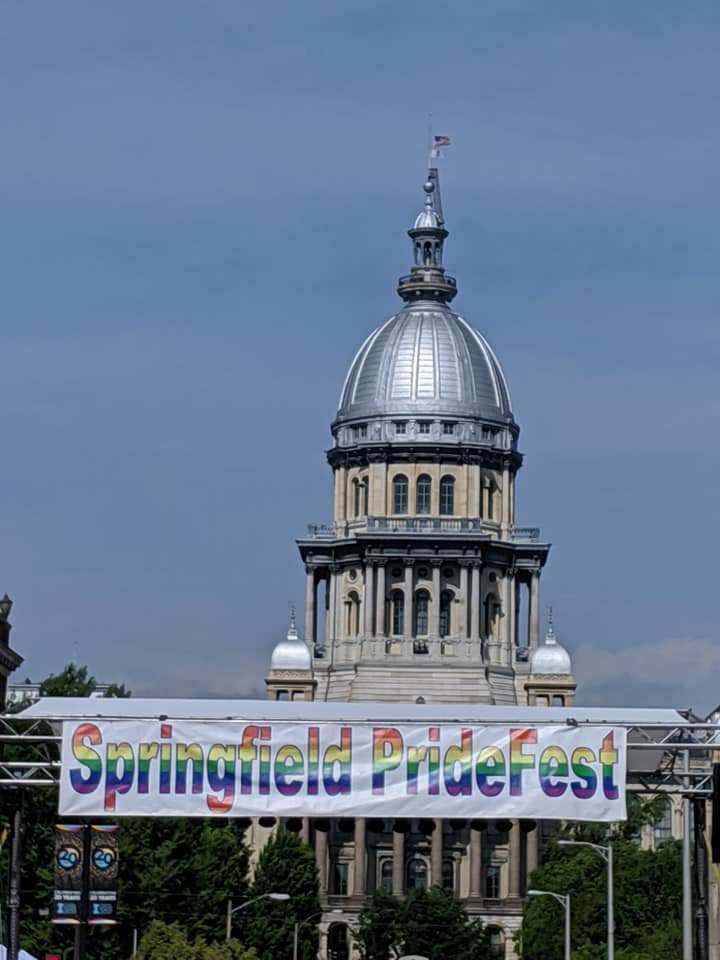 Springfield IL capitol building with pride fest banner